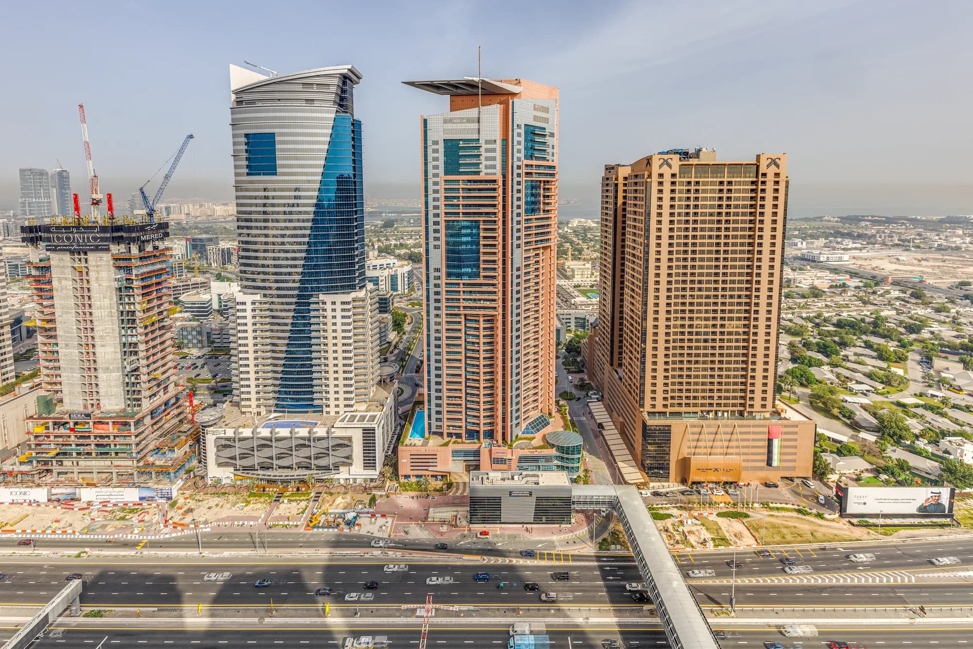 Sheikh Zayed Road and the metro crossing beside Dubai Jewel Tower